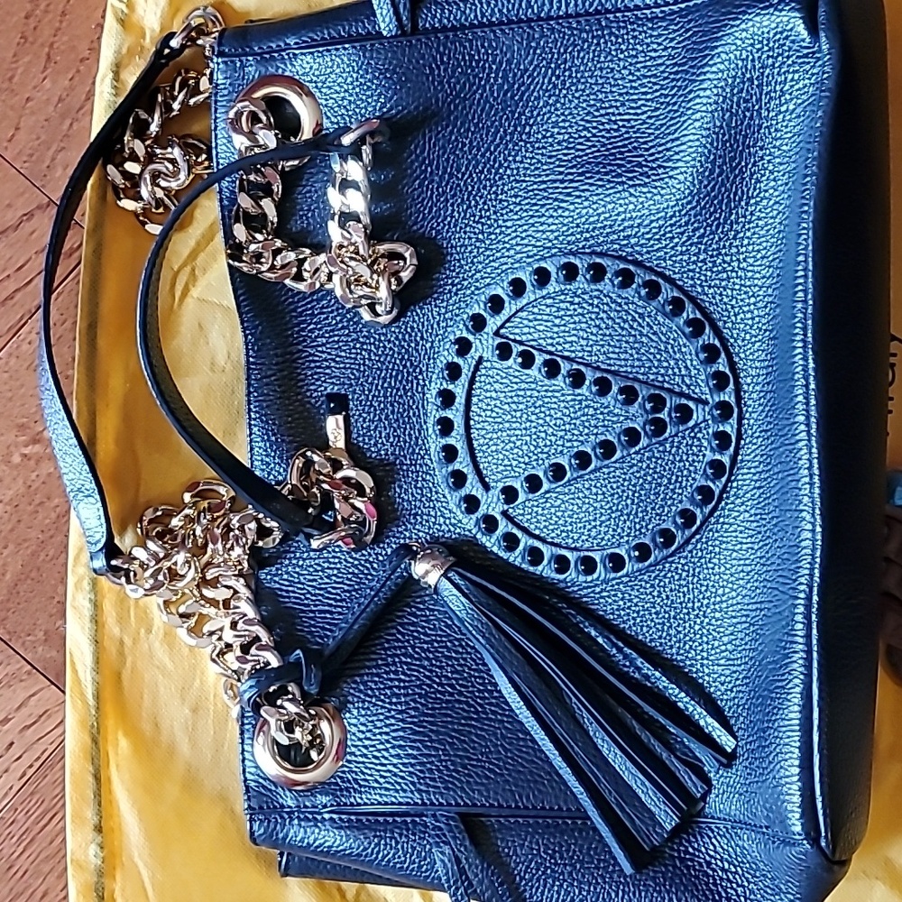 Valentino Luxury Bag with Gold Accents